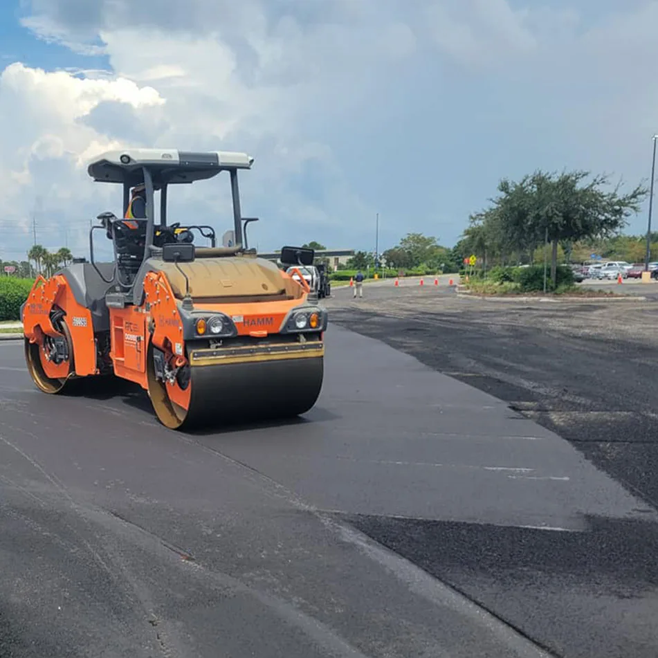 Rolling out asphalt