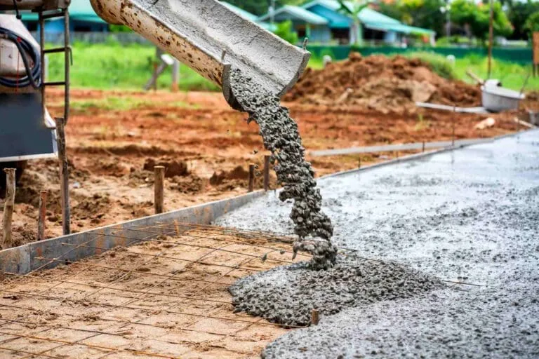 Landmark Paving concrete company pouring fresh concrete for a commercial paving project in Florida