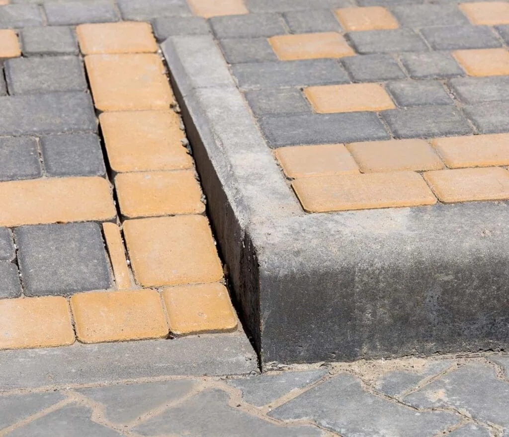 Curb ramp on crosswalk installed as a parking lot safety feature