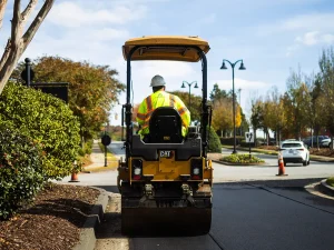 Landmark Paving asphalt roller compacting pothole repair and patching